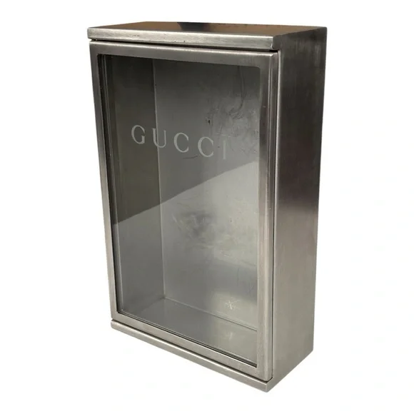 Gucci Made in Italy stainless steel retail counter display merchandise case
